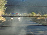 Trip to San Miguel Ixtahuacán - Police Escort Driving in Cloud of Diesel Exhaust Smoke