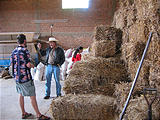 Eronga - Brian - Talking to Farmer about Using Hay Bales for Building Construction