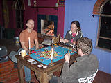 Rancho Madroño - Playing Settlers at the Casita - Geoff, Marie, Lars (photo by Lars)