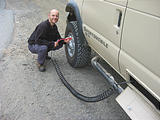 Oregon Dunes NRA - Geoff Airing Up Tires, Which Were Deflated for Driving on Sand - Sportsmobile (October 16, 2004 11:02 AM)