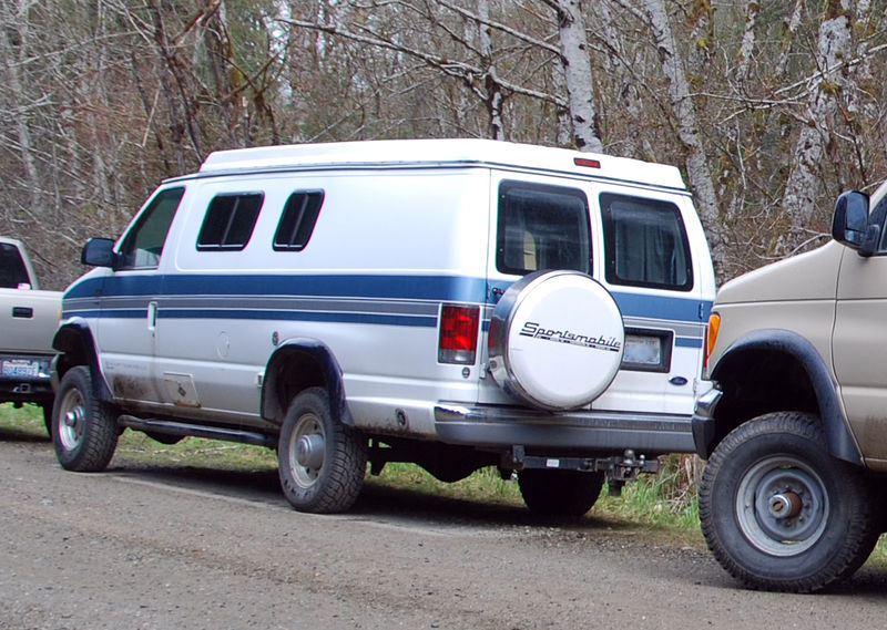 white van with blue stripe