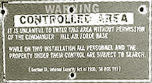 sign at the corner of Hill Air Force Range: "Warning Controlled Area. It is unlawful to enter this area without permission of the commander."
