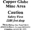 Copper Mine Sign: "Copper Globe Mine Area - Caution - Safety First - 1100 feet deep"