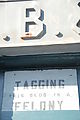 Georgetown - S. B. & M. Co. - Sign: "Tagging This Bldg Is a Felony"