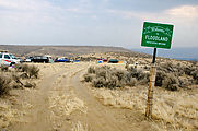 Floodland - Entrance - Sign