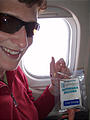 Botswana - Flight from Joburg - Laura with a packet of Biltong, traditional meat jerky