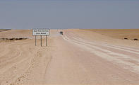 Namibia - Swakopmund - Moon Landscape Tour - Road - Dust Free Section Sign