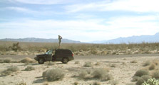 Desert Stop - Geoff on Jeep Photographing (Leo's Photo)