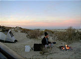 Malarrimo Beach - Campsite Geoff Eating Campfire Sunset (01/02/2002)