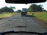 Driving - Road - Traffic Driving Around Huge Potholes (Dec 30, 2005 4:05 PM)