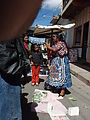 Chichi (Chichicastenango) - Market - Saleswoman Selling Bottled Remedies