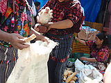 Chichi (Chichicastenango) - Market - Woman with Chicken