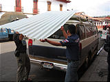 Pátzcuaro - Loading Roof Panels on Van - Brian