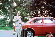 Jim - Red Volvo - Suitcases