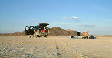 Camping on the playa. Black Rock Point is in the background. (7/12 7:50 PM)