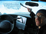 Camping - Cold morning in snow - Scraping ice off inside of windshield with spatula - Geoff - Sportsmobile (7:55 AM Oct 5, 2005)