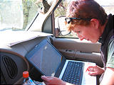 Comb Ridge - Laura Navigating with Topo Maps on Computer (3:34 PM Oct 9, 2005)