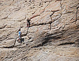 Comb Ridge - Butler Wash Ruin - People Climbing Down with Ropes