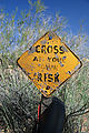 Deker's Road - Bridge Made of Car - Sign - Cross at Your Own Risk